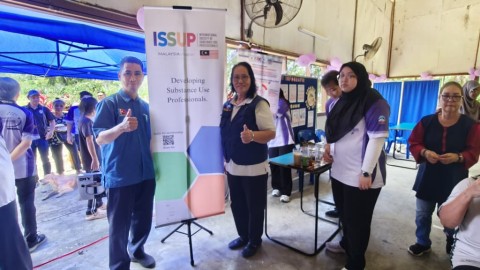 Dr. Nazri and team at the event