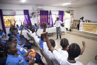 students paying attention to the message of Rofi Cameroon