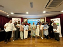 Group photo of participants with funder's team